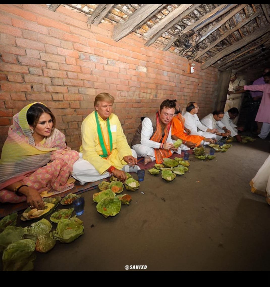 Doland and Komela enjoying a desi feast